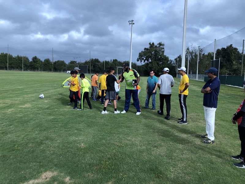 Dunae Nathaniel, former USA Player, U19 player (2006) & Antigua U13, U16 & U19 player interacting with Adam Hassan with other coaches & youth participants